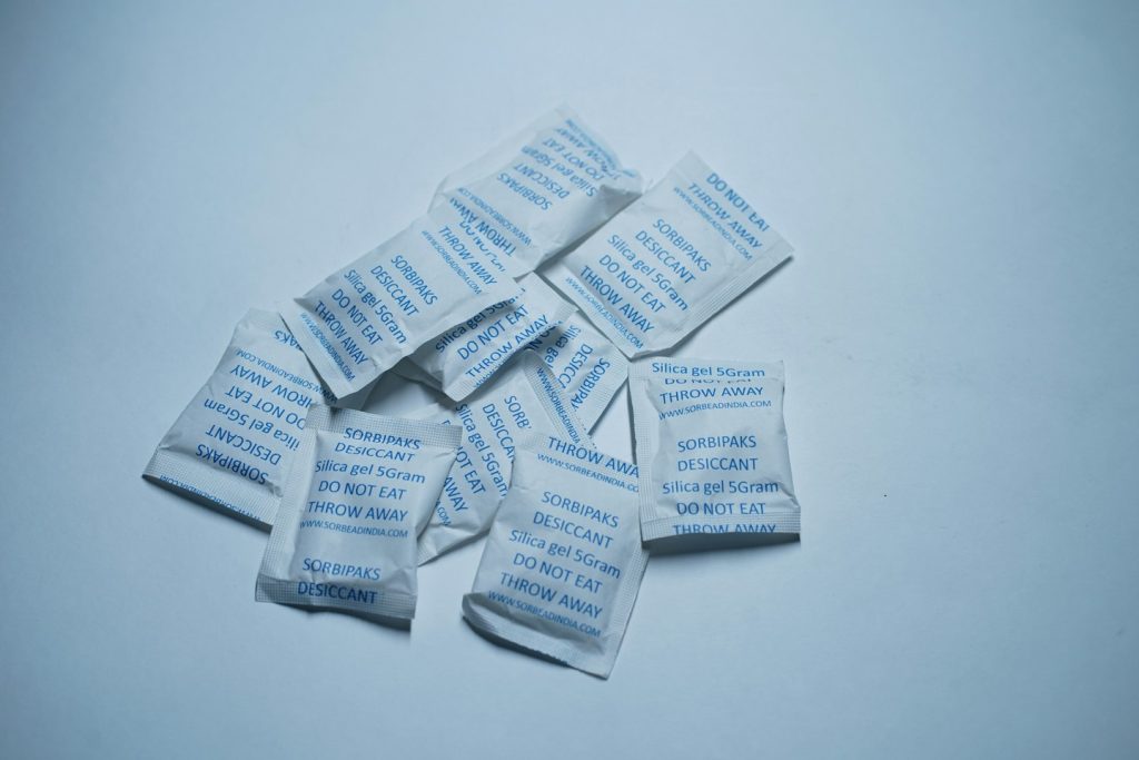 stack of silica gel packages
