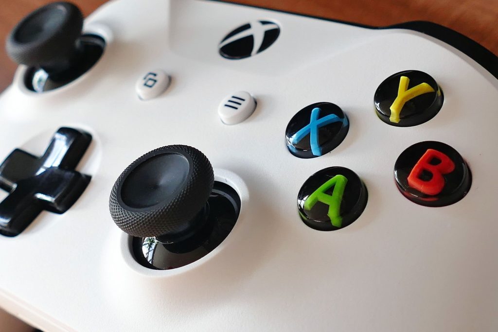 closeup photo of an white xbox controller